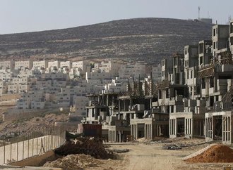 613054-a-construction-site-is-seen-in-jewish-settlement-near-jerusalem.jpg